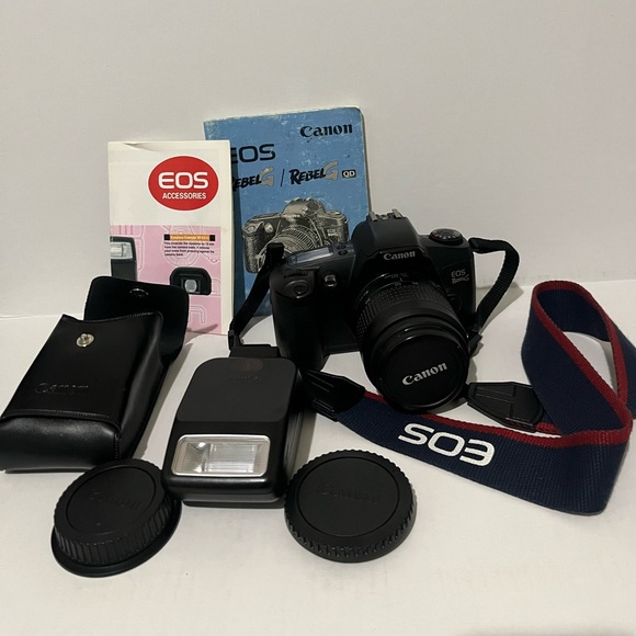 Canon EOS Rebel Camera with Black and Red Strap